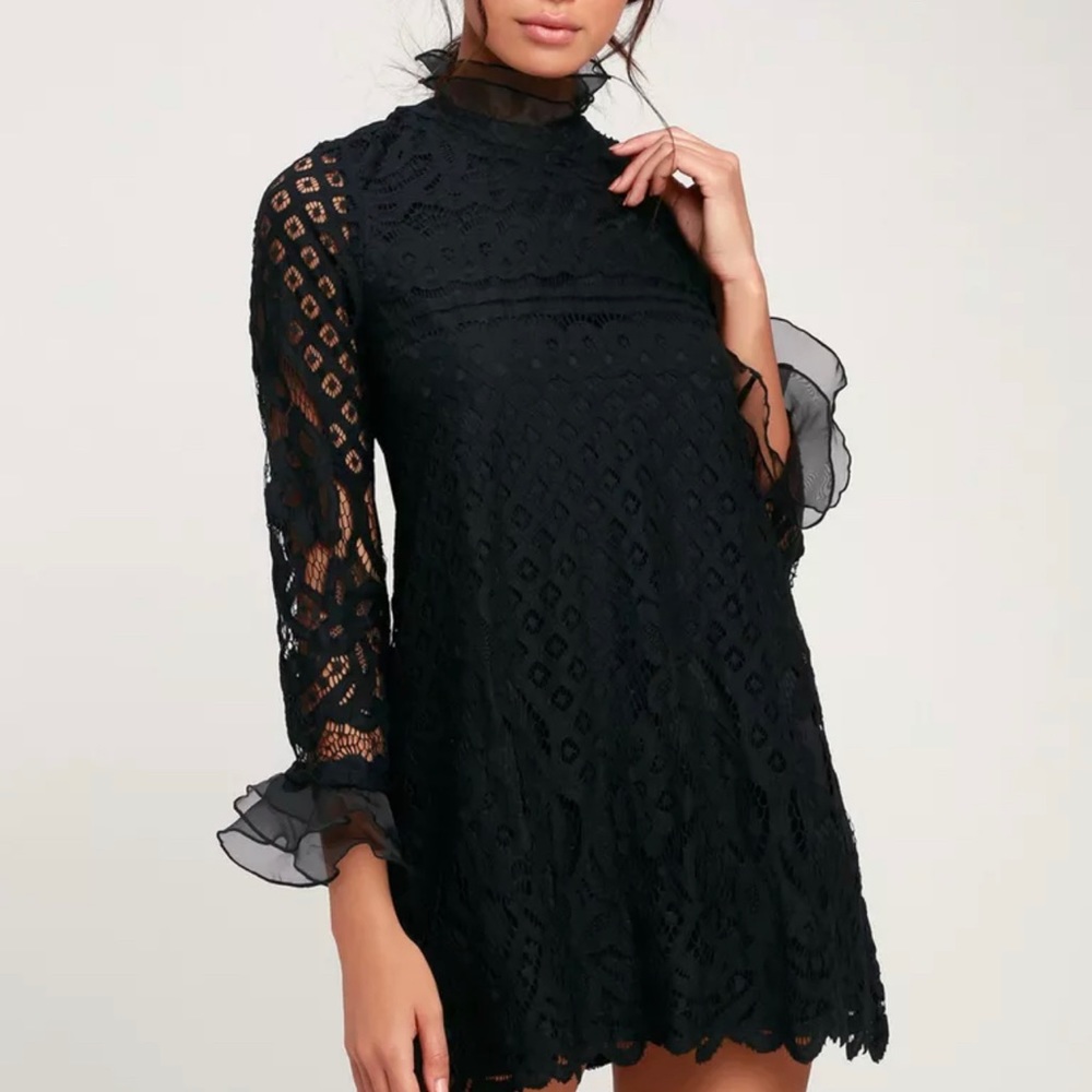 Lulus black lace turtle neck mini dress with flared sleeves.